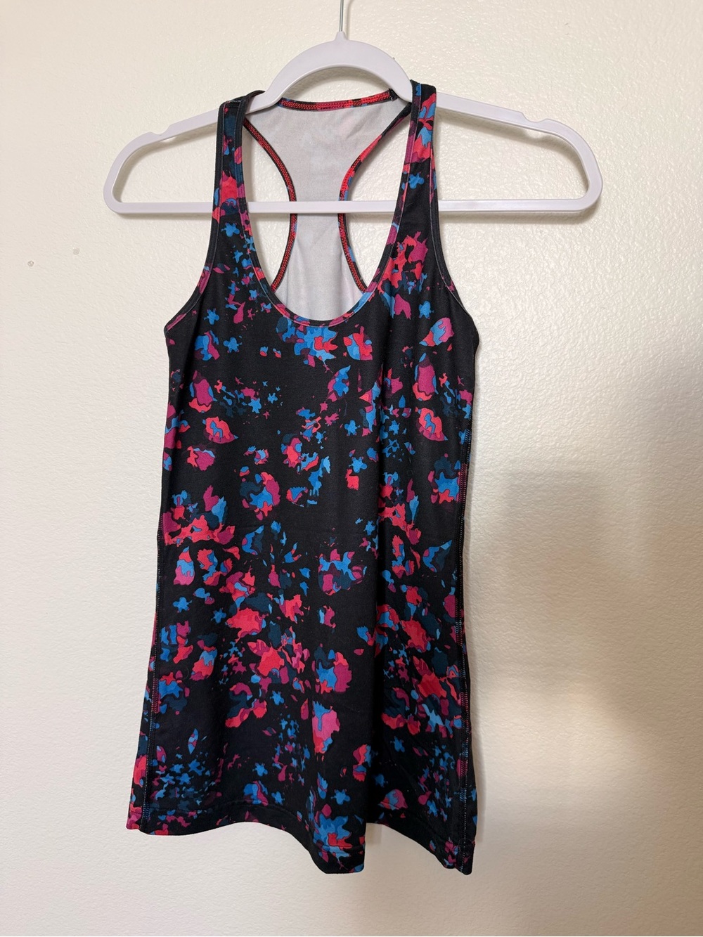 Black Lululemon tank with colorful splatter design